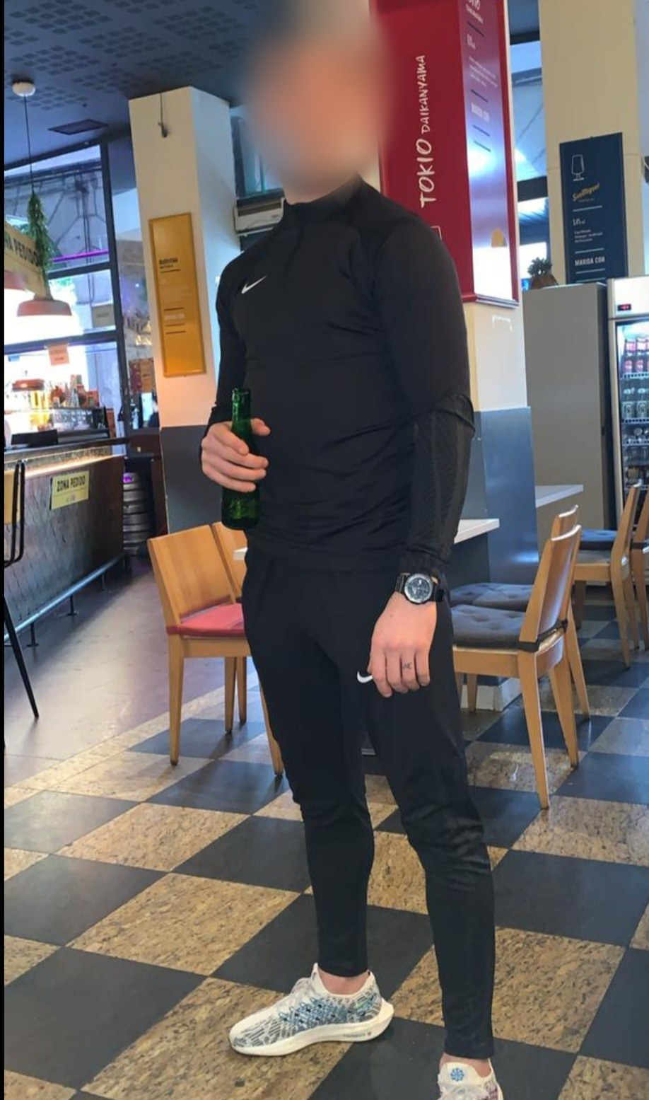 Former client in Spain after his release, face blurred for privacy
